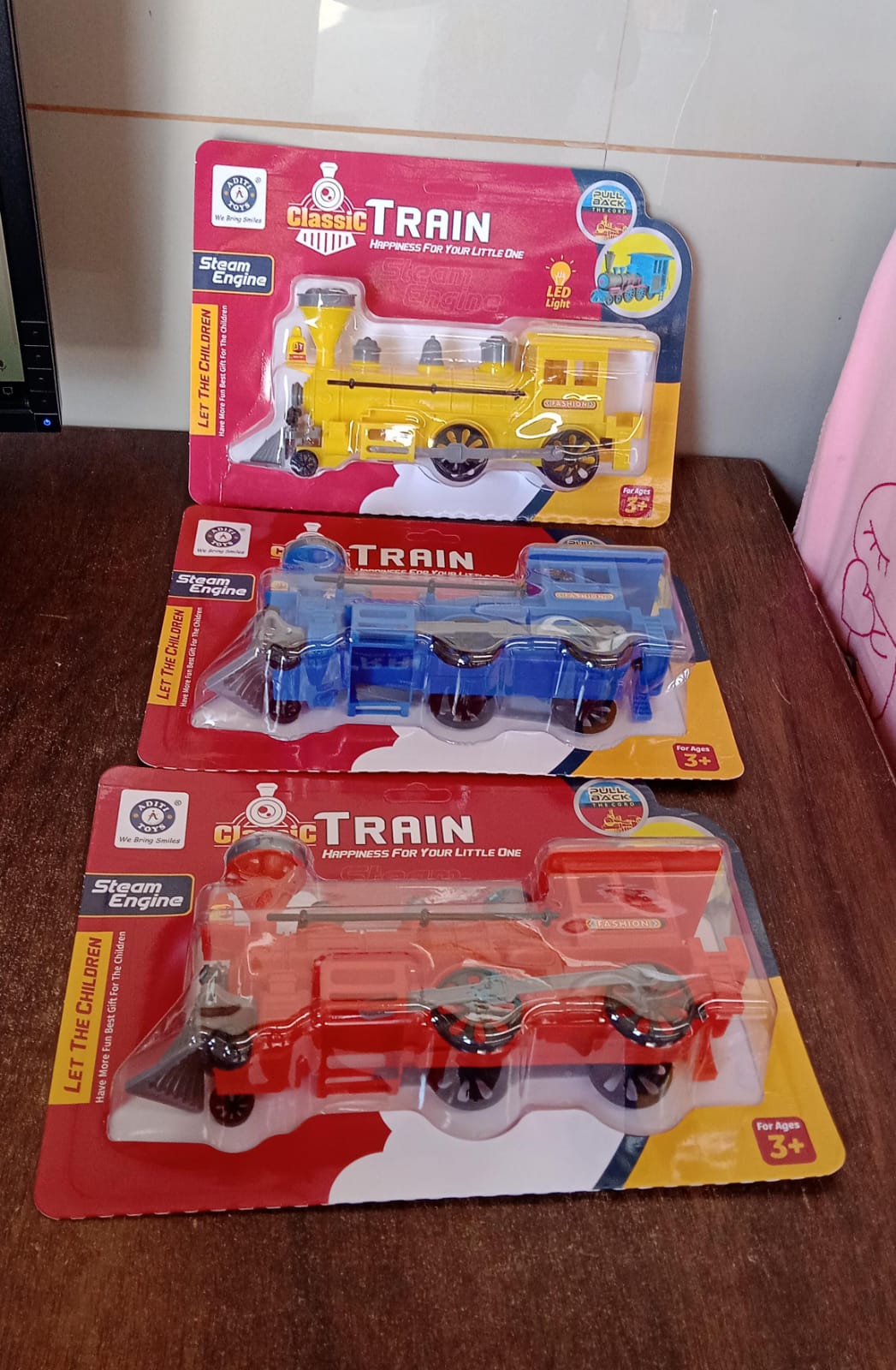 Pull and Go Train with Light Plastic String Pull Back Train (1 Pc / Mix Color) Pull and Go Train with Light Plastic String Pull Back Train (1 Pc / Mix Color)